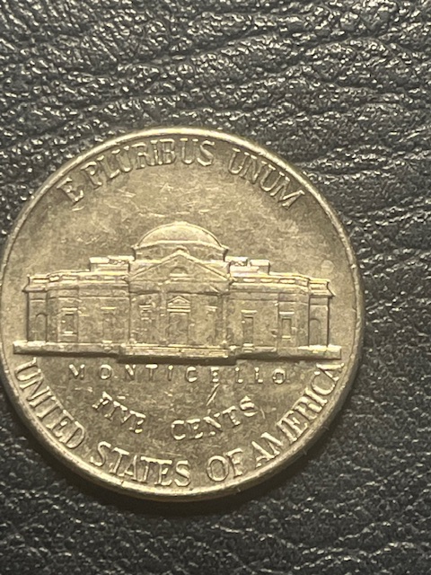 Jefferson-Nickels-1996-P-With-Metal-Accumulation--Near-The-Mouth-&-We